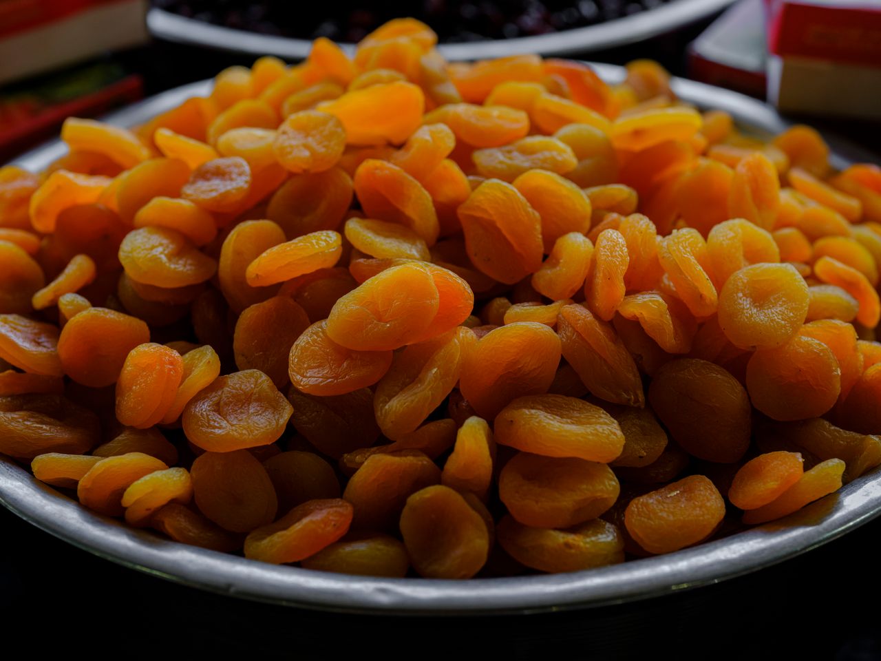 A vibrant display of dried apricots, perfect for a healthy snack or gourmet cooking.